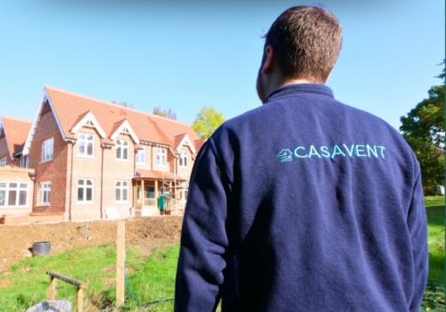 Casavent operative looks at a house to survey